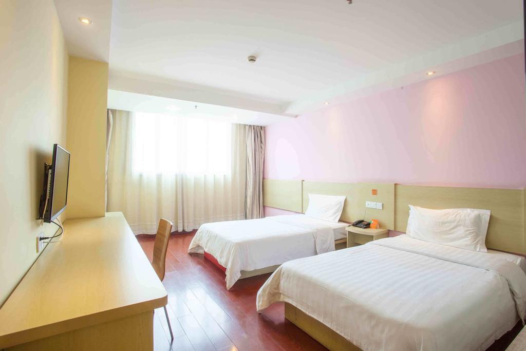 7Days Inn Guangzhou Xinshi Номер фото