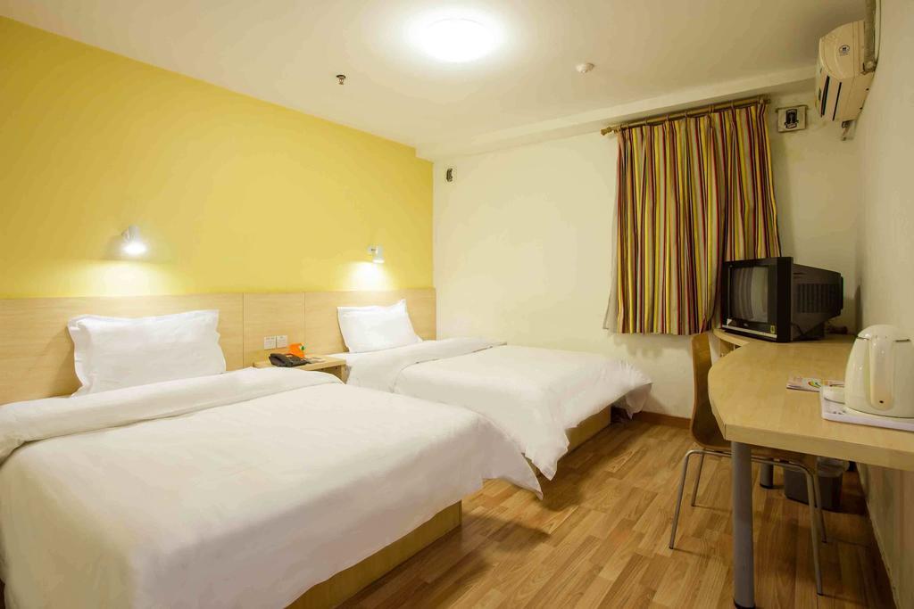 7Days Inn Guangzhou Xinshi Номер фото